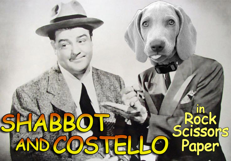 Shabby's head on Bud Abbott's body as he leans into Lou Costello with his right fist on his left palm